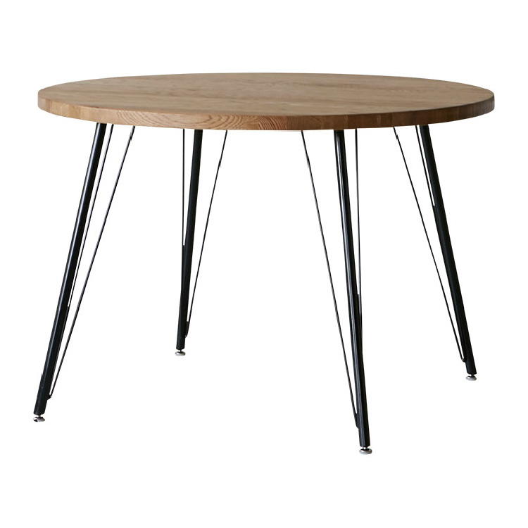 風合いの異なる素材を組み合わせたシンプルな円形テーブル